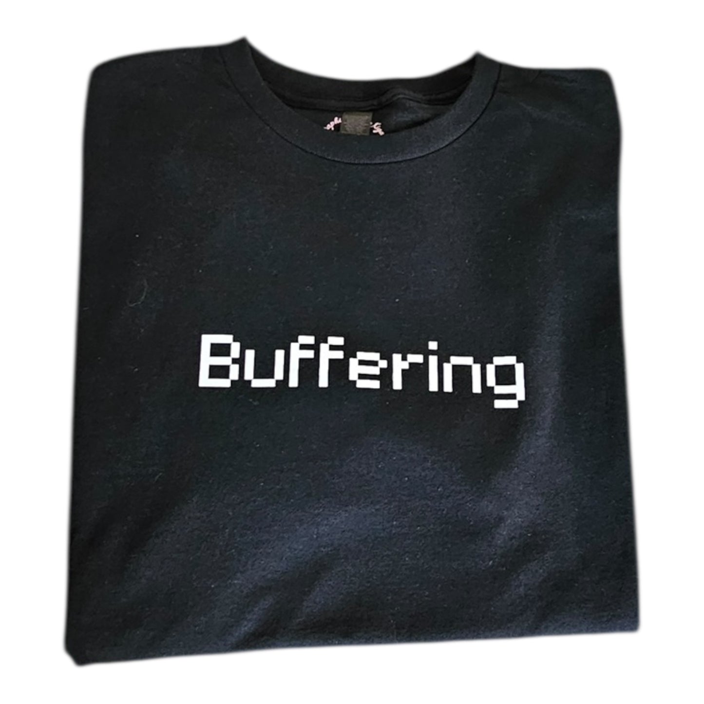 The Buffering Black Graphic Tee by Try My Closet features Buffering in white, pixelated text—ideal for days you feel overstimulated.