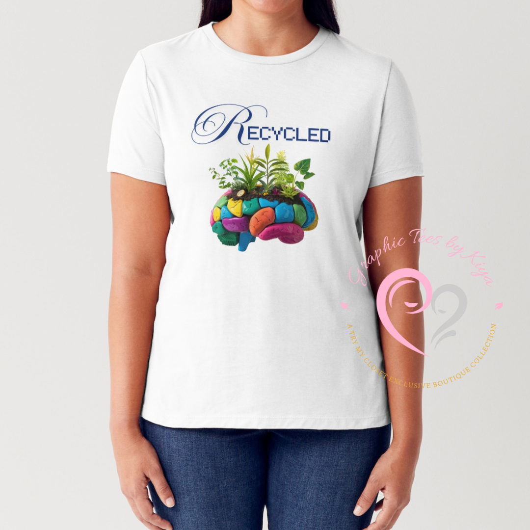 A woman wears the Try My Closet Recycled Mind Graphic Tee, featuring Recycled and a colorful brain with green plants on white fabric. Graphic Tees by Keya appears as a watermark at the shirt’s lower right, highlighting sustainable fashion.