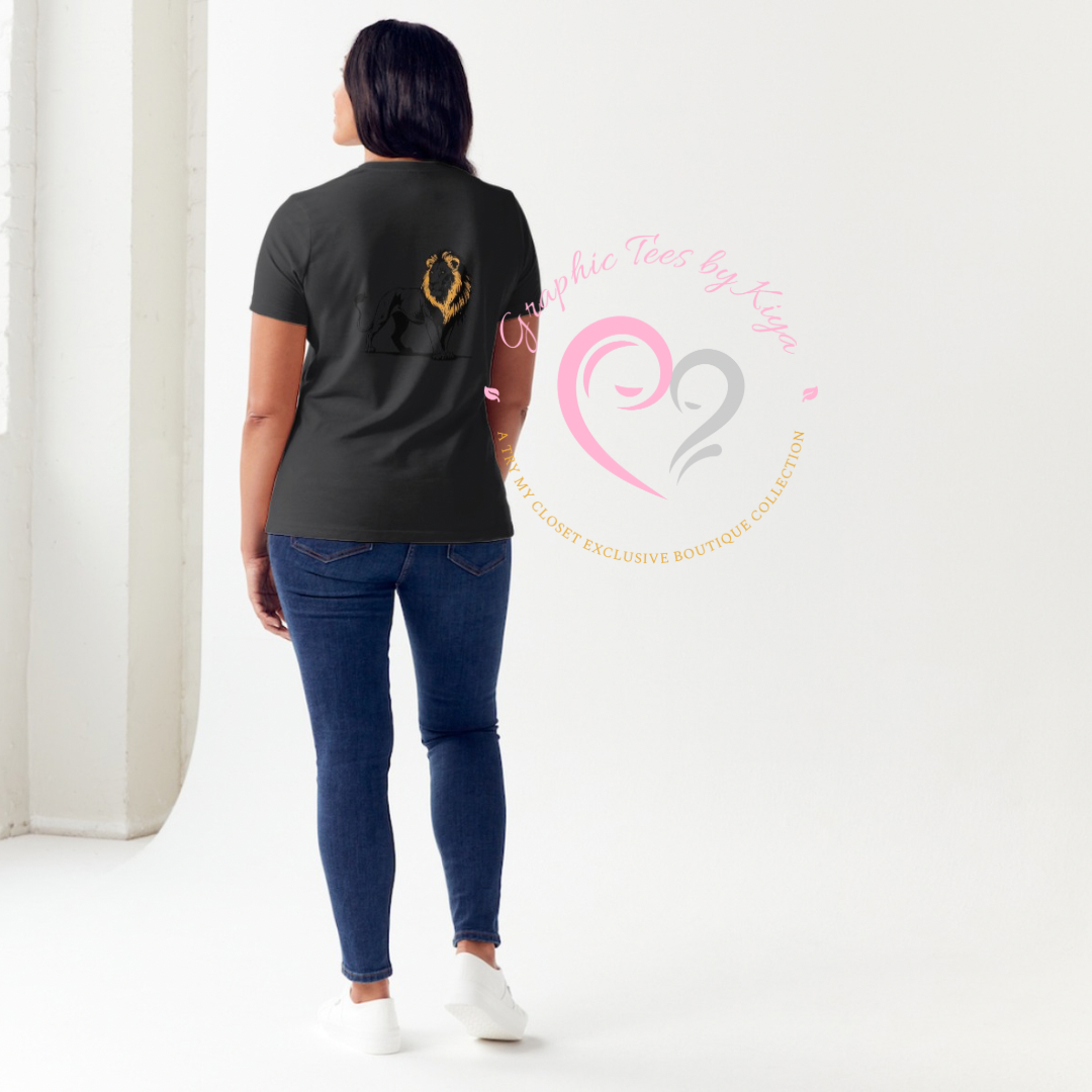 A woman faces away in a bright room, wearing the Protective Graphic Tee by Try My Closet—a black shirt with a gold and black back graphic—blue jeans, and white shoes. Pink text overlay reads “Graphic Tees by Try My Closet.” Custom orders available.