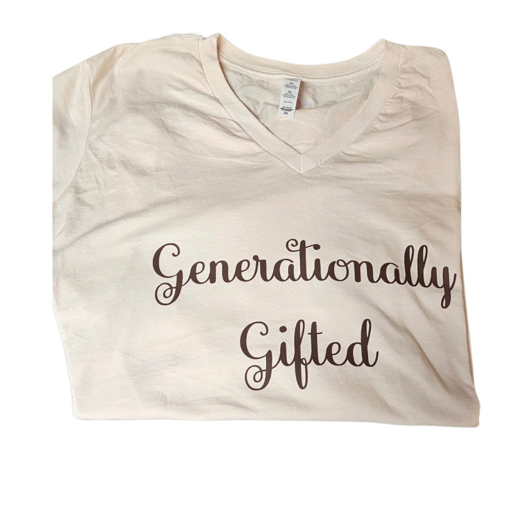 A folded white V-neck t-shirt from Try My Closet features Generationally Gifted in brown script—ideal for those seeking exclusive designs or placing custom orders with the Custom Orders option.