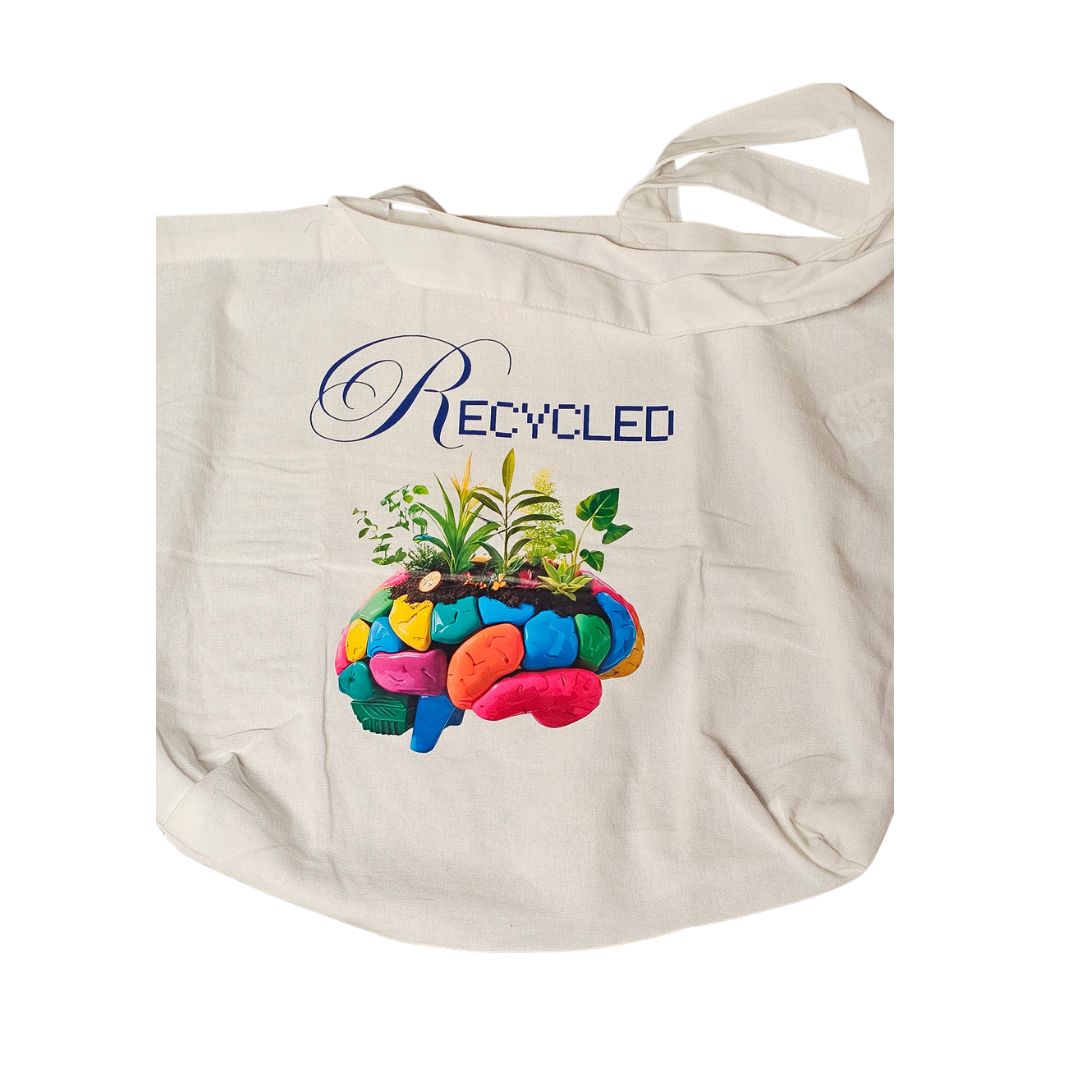 The Recycled Mind Reusable White Tote by Try My Closet features a vibrant brain with green plants—an eco-chic accessory for mindful living.