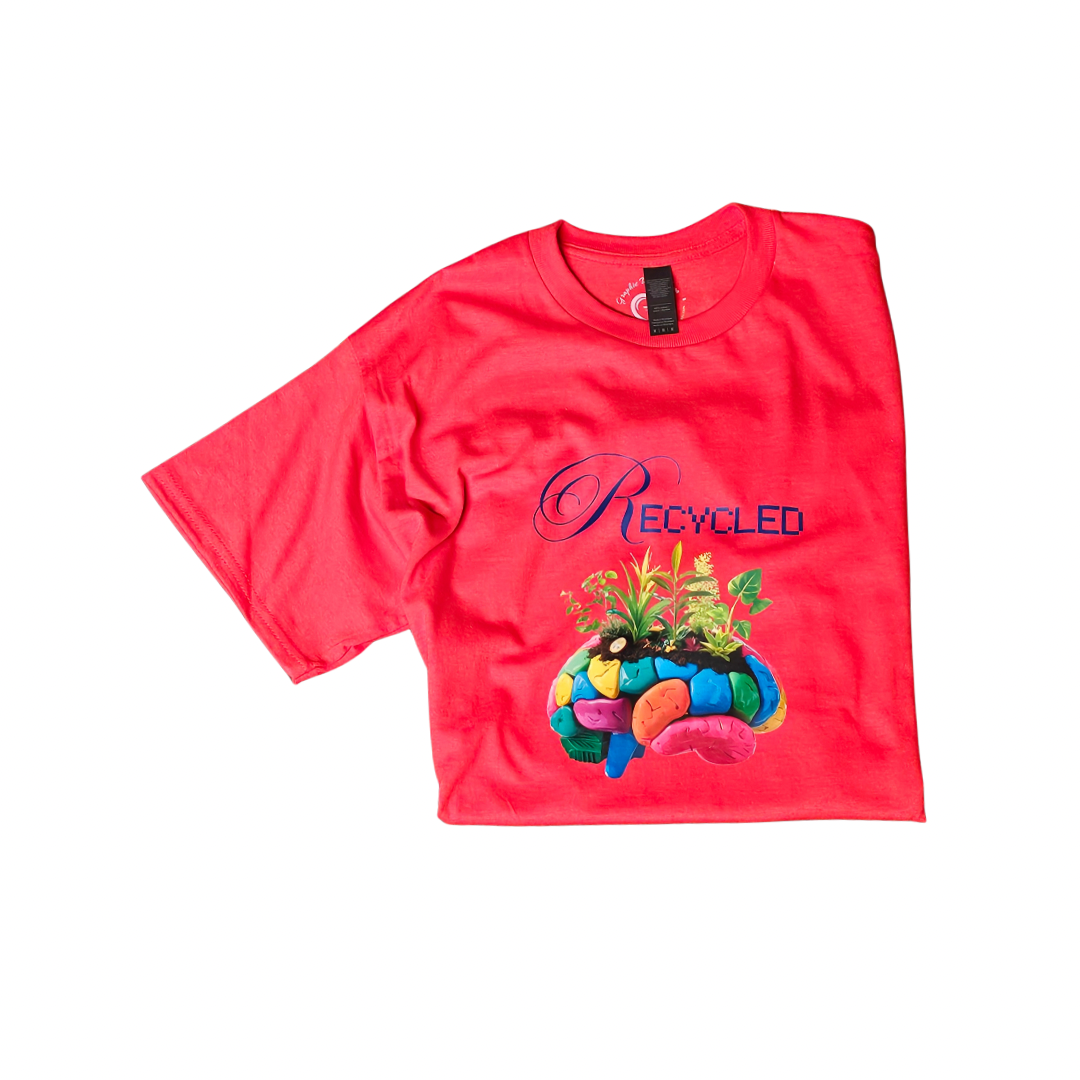 The Recycled Mind Graphic Tee by Try My Closet features Recycled above colorful stones and green plants on bright red fabric—a standout, eco-friendly fashion choice for sustainable style lovers.
