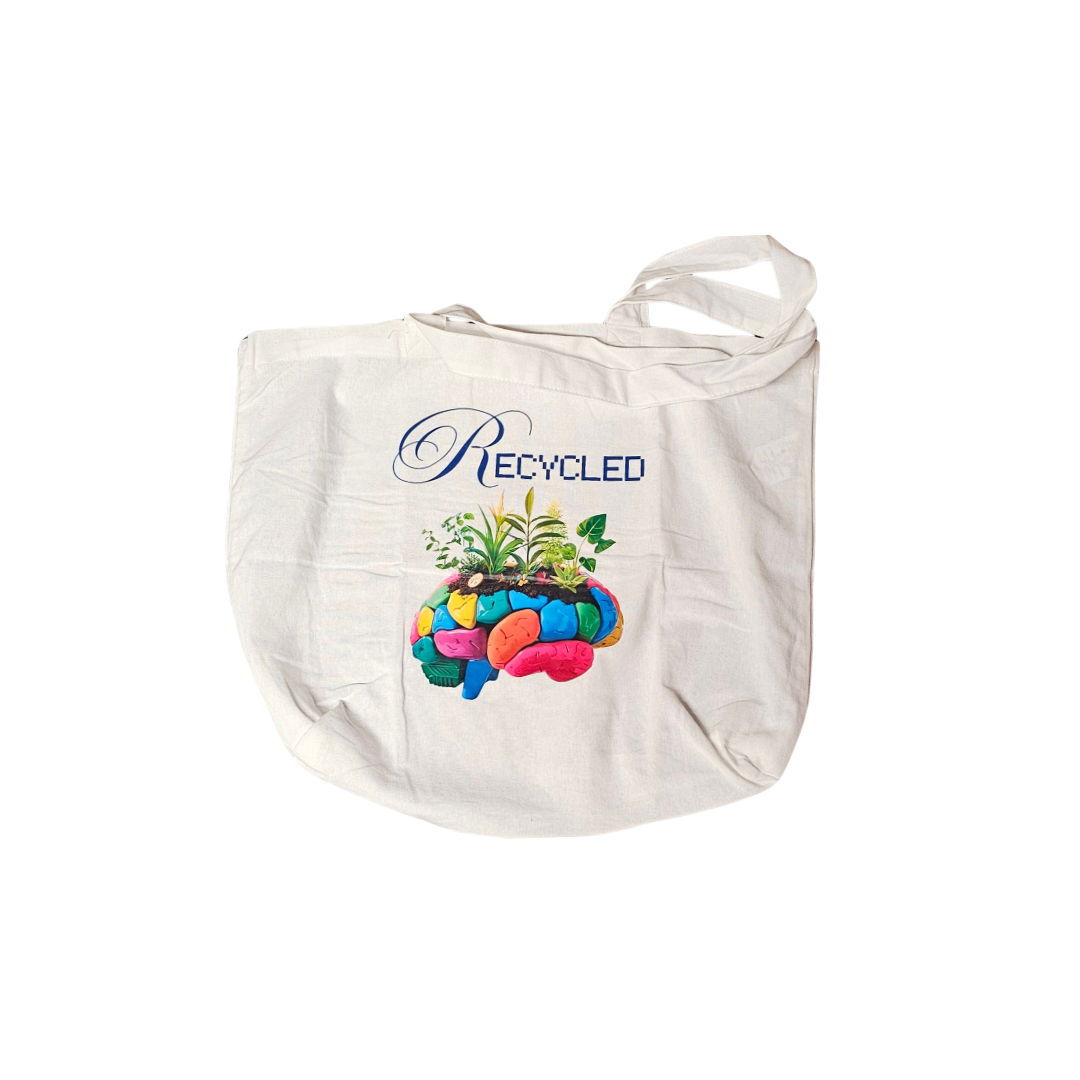 The Recycled Mind Reusable White Tote by Try My Closet features a vibrant brain design with “Recycled Mind” text and green plants, making it an eco-chic statement piece.