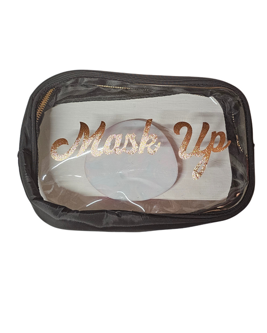 The Try My Closet Her Retro Superpower Mask Up Cosmetic Pouch is a transparent bag with a zippered top, showcasing a white item inside and Mask Up in gold script—an elegant way to store your beauty essentials.