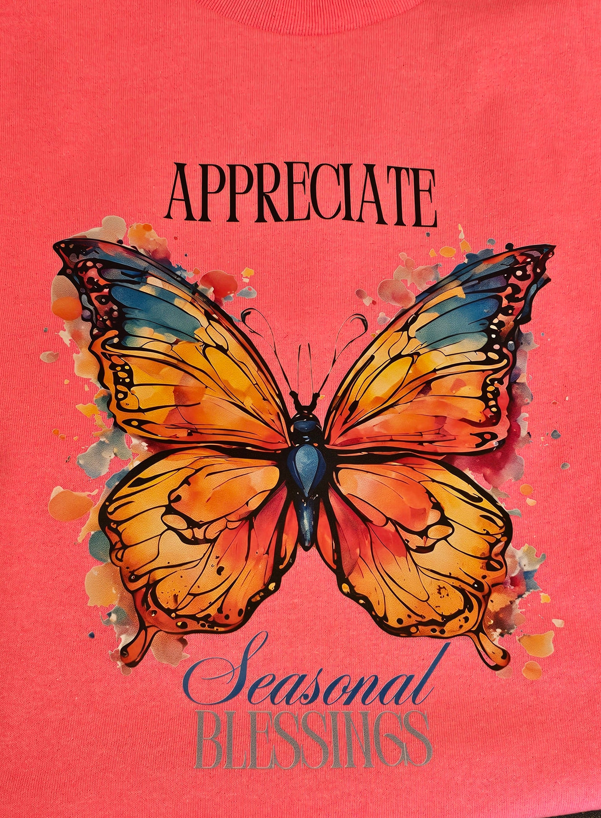 A vibrant orange, yellow, blue, and black butterfly illustration with APPRECIATE above and Seasonal BLESSINGS below celebrates Mental Health on bright pink—perfect for Try My Closet’s Collab Gift Graphic Tees and Totes.