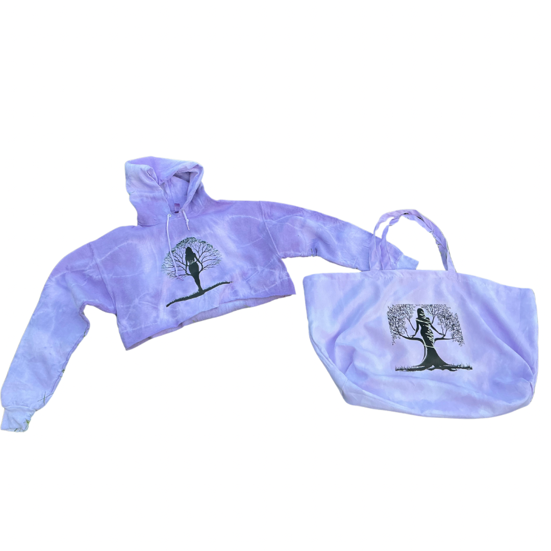 The Try My Closet She’s Rooted in Family Cropped Hoodie Oversized Tote Tie-Dye Set (Purple, Large) features a black woman/tree silhouette and symbolizes deep family roots and connections.