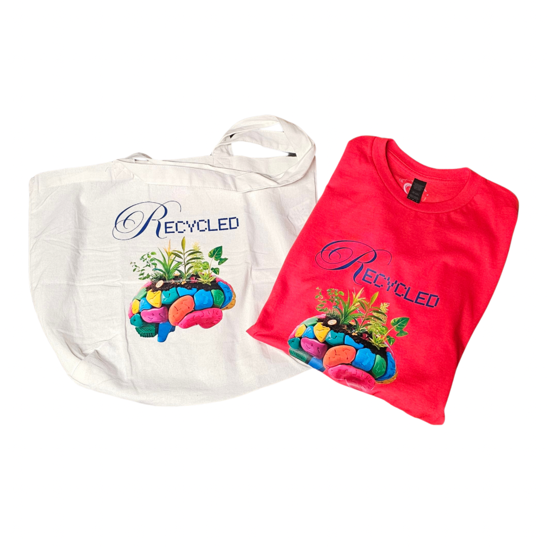 Try My Closets Collab Gift Graphic Tees and Totes feature a bold brain-and-plant RECYCLED graphic—ideal for mental health awareness. The white tote lies flat beside the neatly folded red tee.