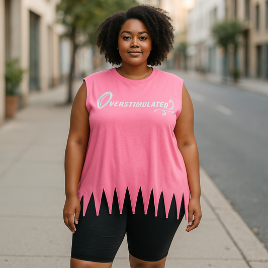 A woman stands on a tree-lined city sidewalk wearing the Try My Closet Retro Style Overstimulated Graphic Tee in hot pink (LMT ED), paired with black shorts. She showcases the included free matching scrunchie.