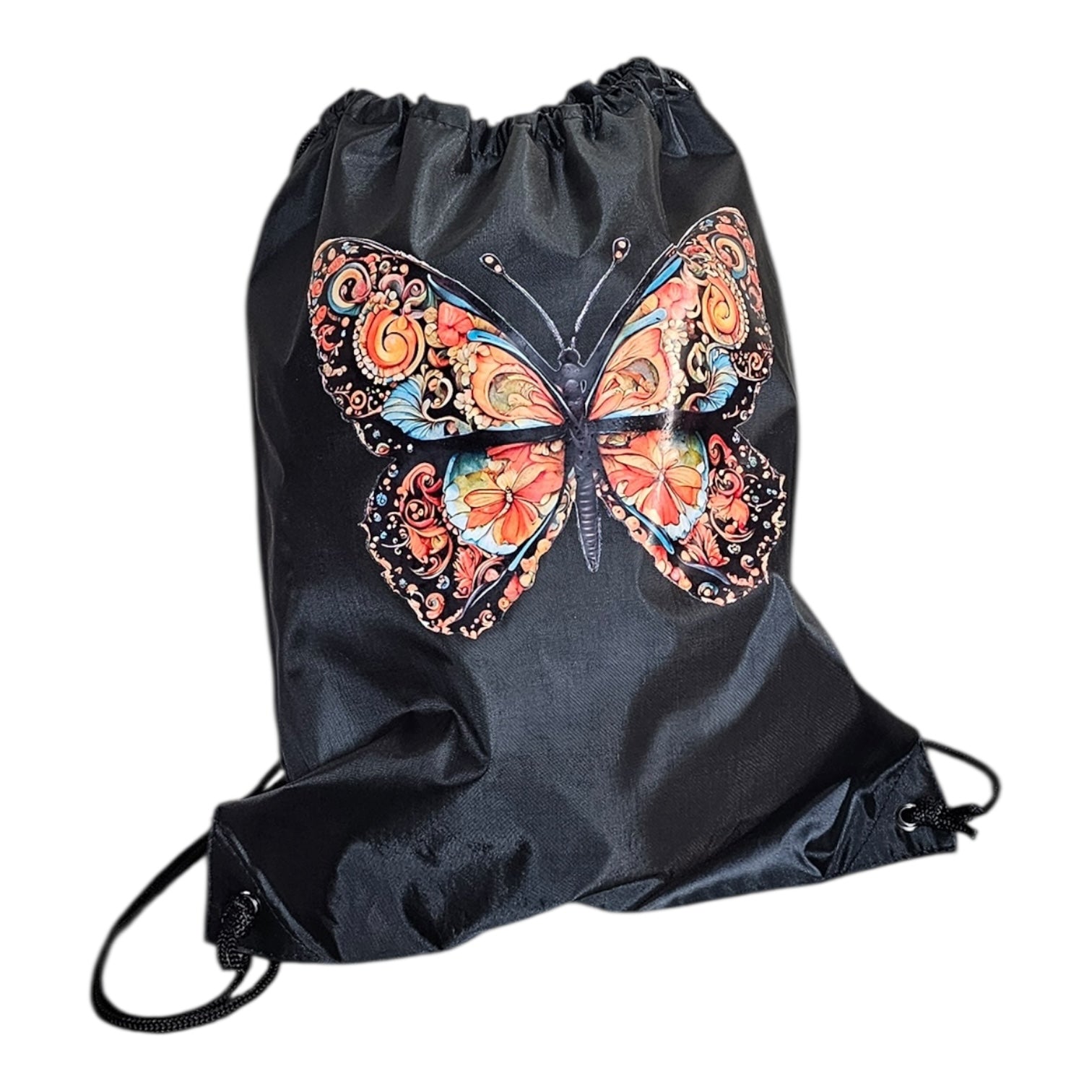 The Try My Closet Morphed Black Graphic Tee With Lightweight Drawstring Backpack Value Set includes a black bag featuring an ornate butterfly design in vibrant orange, blue, and yellow.