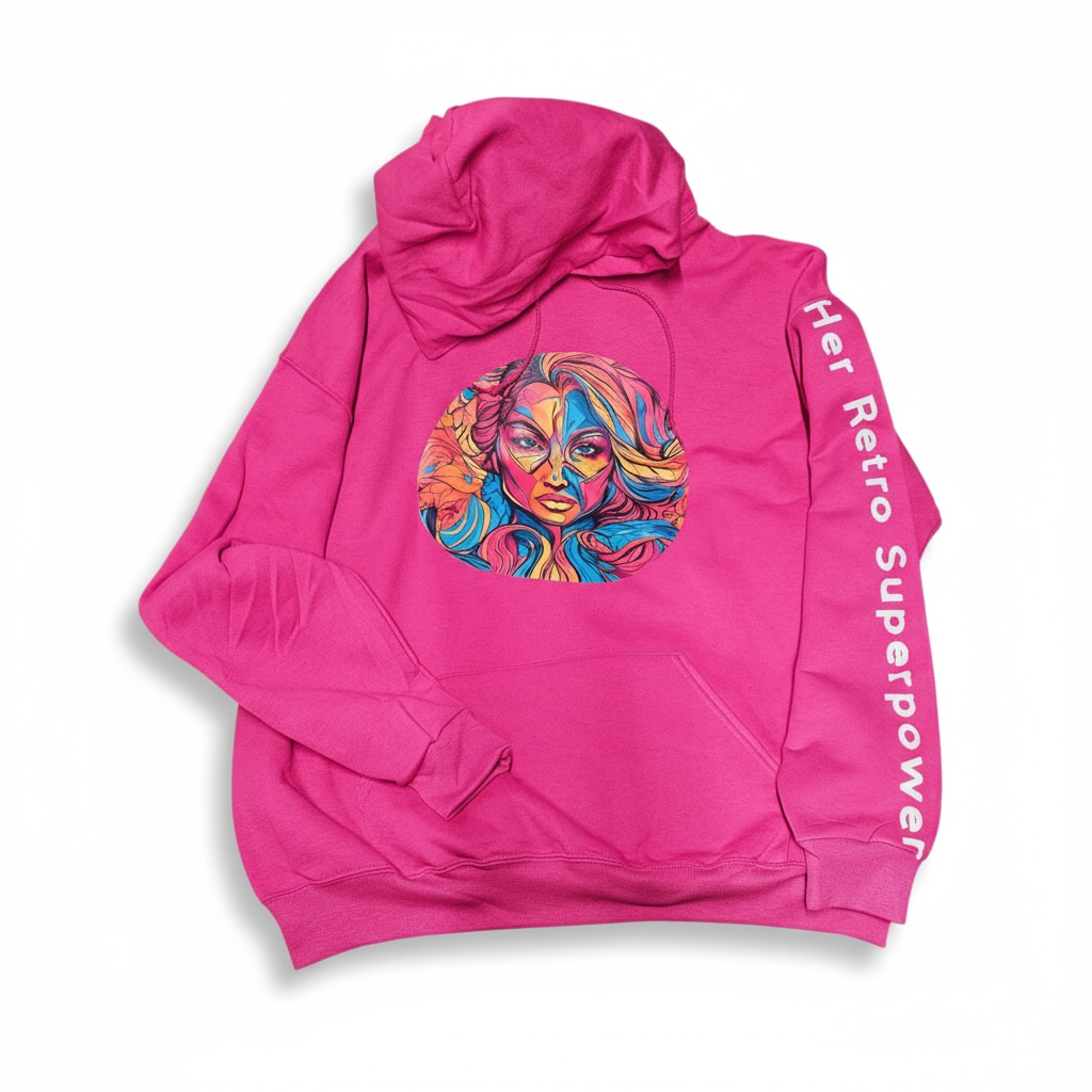The Her Retro Superpower Pink Oversized Hoodie Worded Sleeve by Try My Closet features a bold abstract woman's face and “Her Retro Superpower” in white capitals on the right sleeve—a standout, colorful statement piece.