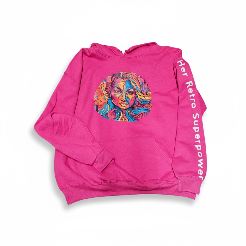 The Her Retro Superpower Pink Oversized Hoodie by Try My Closet features a vibrant illustrated woman's face on the chest and “Her Retro Superpower” in white along the right sleeve—perfect for standout retro style.