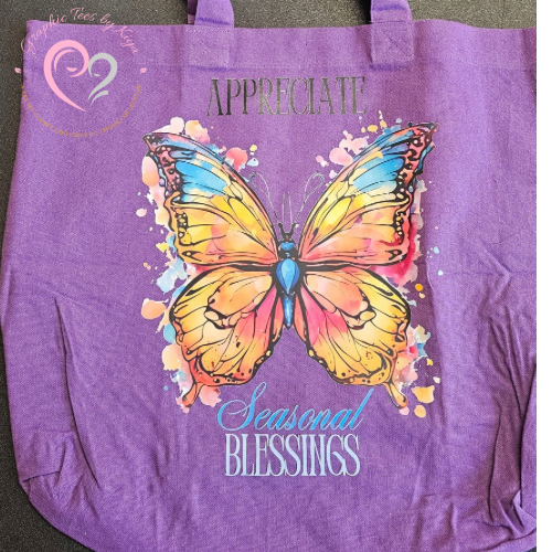 The Appreciate Seasonal Blessings Reusable Tote by Try My Closet features a vibrant butterfly with blue, yellow, and pink wings, framed by “APPRECIATE Seasonal BLESSINGS” above and below.
