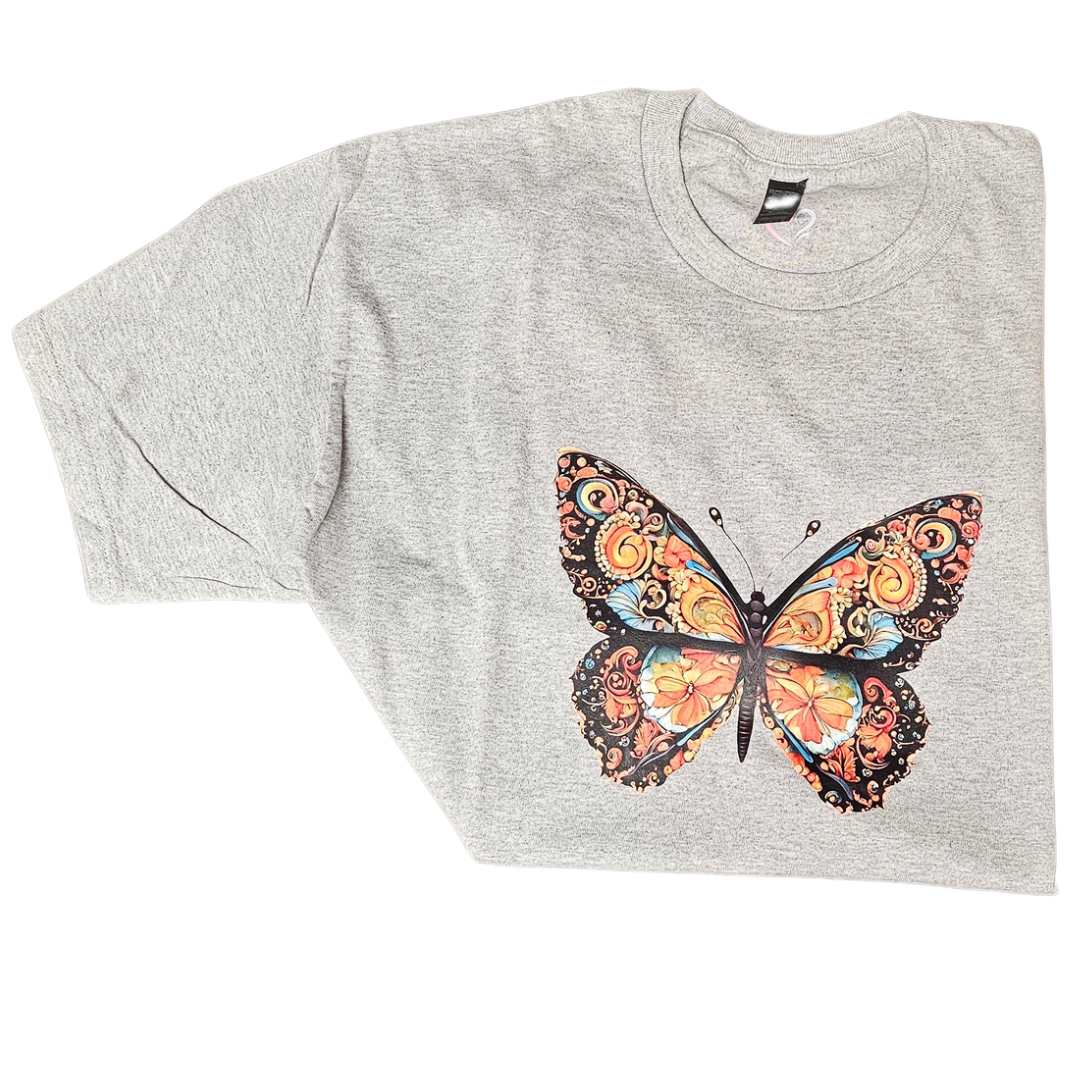 The Try My Closet Morphed Graphic Tee in light gray showcases a vibrant butterfly graphic with orange, yellow, and black wing details on a white background. Custom orders for unique styles are available.