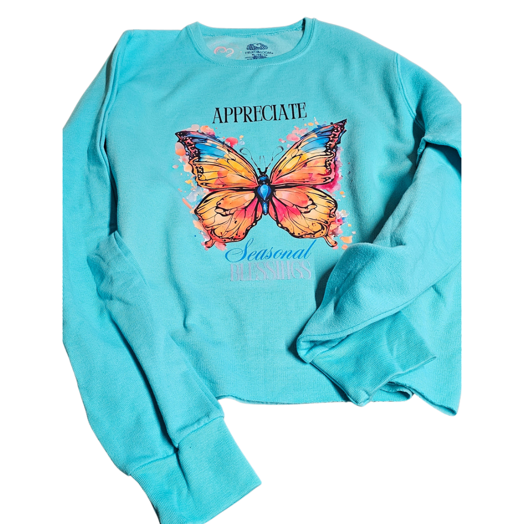 The Try My Closet Appreciate Seasonal Blessings Cropped Turquoise Sweatshirt (Size XL) features a large, colorful butterfly with Appreciate Seasonal Blessings printed above and below. Custom orders available.